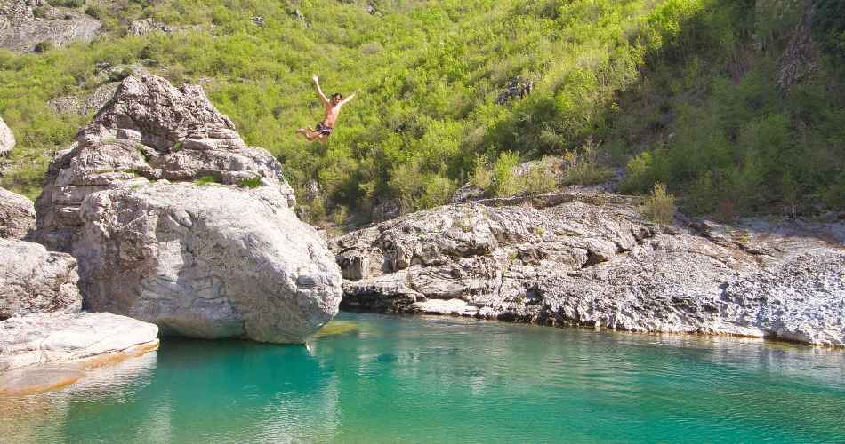 Cliff jumping into Kanione Prekal Shkodra